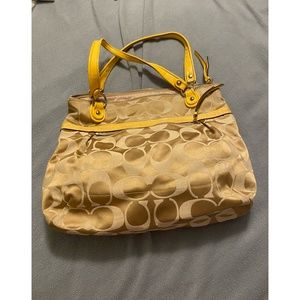 Coach cloth insignia C purse with yellow accents